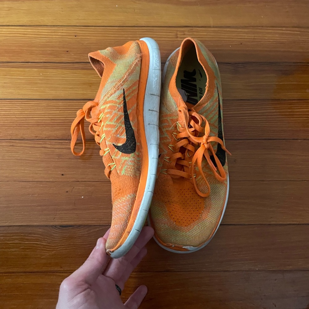 Nike Orange Flyknit Shoes / 11.5